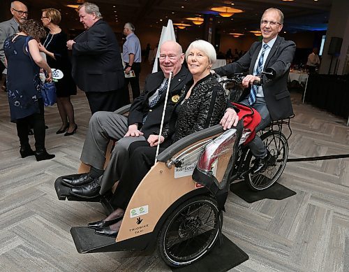 JASON HALSTEAD / WINNIPEG FREE PRESS

L-R: Bob and Audrey Vandewater and Garry Nenson (CNIB Manitoba executive director) try out the Trio Bike at the Canadian National Institute for the Blind's Eye on the Arts benefit auction on March 1, 2018 at the RBC Convention Centre Winnipeg. Audrey is a client of the CNIB Manitoba and both she and both have been CNIB supporters and volunteers. (See Social Page)