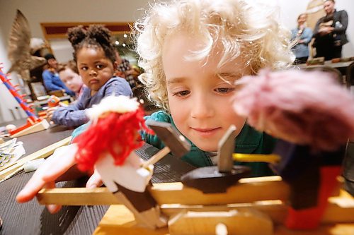 JOHN WOODS / WINNIPEG FREE PRESS
Jax Carriere, 7, plays with games and toys in the Manitoba Museum's Discovery Centre as Connolly Ross, 3.5, looks on during spring break in Winnipeg Monday, March 26, 2018.