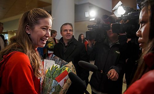 MIKE DEAL / WINNIPEG FREE PRESS
Kaitlyn Lawes a member of the Jennifer Jones team that won the World Women's Curling Championship in North Bay, Ontario, arrives home to Winnipeg and is greeted by a legion of fans Monday afternoon.
180326 - Monday, March 26, 2018.