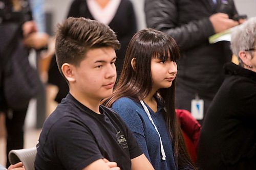 MIKAELA MACKENZIE / WINNIPEG FREE PRESS
Joseph Ginter (left) and Trinity Harry, who co-created a tribute to Tina Fontaine, listen as Jane Philpott, Minister of Indigenous Services, announces funding to support Ndinawe Youth Resource Centre expansion in memory of Tina Fontaine in Winnipeg on Tuesday, March 27, 2018.
Mikaela MacKenzie / Winnipeg Free Press 27, 2018.