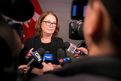 MIKAELA MACKENZIE / WINNIPEG FREE PRESS
Jane Philpott, Minister of Indigenous Services, scrums with the media after announcing funding to support Ndinawe Youth Resource Centre expansion in memory of Tina Fontaine in Winnipeg on Tuesday, March 27, 2018.
Mikaela MacKenzie / Winnipeg Free Press 27, 2018.