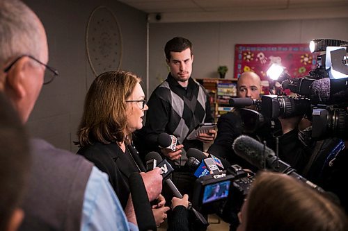 MIKAELA MACKENZIE / WINNIPEG FREE PRESS
Jane Philpott, Minister of Indigenous Services, scrums with the media after announcing funding to support Ndinawe Youth Resource Centre expansion in memory of Tina Fontaine in Winnipeg on Tuesday, March 27, 2018.
Mikaela MacKenzie / Winnipeg Free Press 27, 2018.