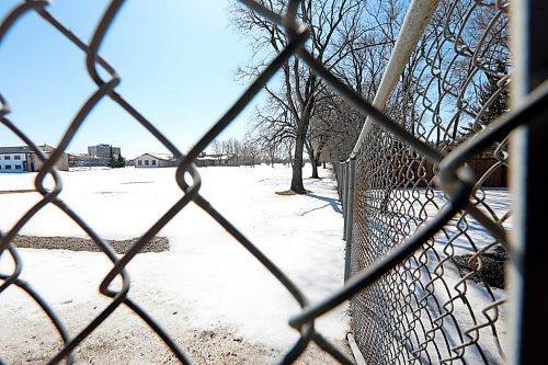 RUTH BONNEVILLE  /  WINNIPEG FREE PRESS

Photo taken from Grant Ave. looking southward through the fence of Kapyong Barracks with row of residential homes on far left side.   For story on comments from residences in area about the future use of the land.

March 27,  2018