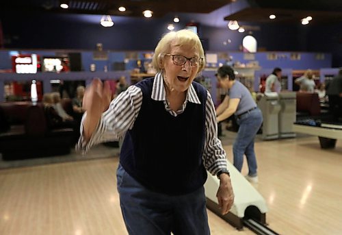 RUTH BONNEVILLE / WINNIPEG FREE PRESS

Sonia Hosfield who is in her 80's, celebrates after knocking down all the pins in one of her throws while bowling at Academy Bowling Lanes with the Women's Seniors Bowling league, called Early Risers, Tuesday.  Hosfield has been bowling in the this longstanding league for 56 years.

Standup photo 

March 27,  2018
