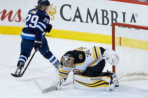 Winnipeg Jets' Patrik Laine (29) scores the game winning penalty shot during the shootout in NHL action against the  Boston Bruins in Winnipeg on Tuesday, March 27, 2018. THE CANADIAN PRESS/John Woods