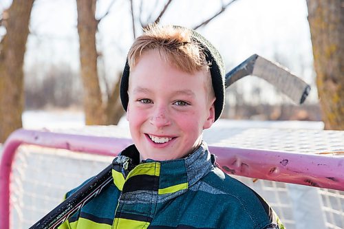 MIKAELA MACKENZIE / WINNIPEG FREE PRESS
Caleb Nobel on the backyard rink in Transcona in Winnipeg on Wednesday, March 28, 2018.
Mikaela MacKenzie / Winnipeg Free Press 28, 2018.