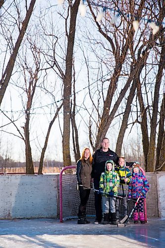 MIKAELA MACKENZIE / WINNIPEG FREE PRESS
Celia and Brant with their kids Adam, Caleb, and Kyla Nobel pose for a portrait on their backyard rink in Transcona in Winnipeg on Wednesday, March 28, 2018.
Mikaela MacKenzie / Winnipeg Free Press 28, 2018.
