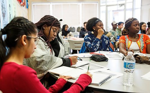 MIKE DEAL / WINNIPEG FREE PRESS
Mac Decembre (second from left) and about thirty-five other youth take part in the employment preparation program at NEEDS Inc. on Thursday.
180329 - Thursday, March 29, 2018.