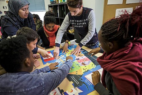 MIKE DEAL / WINNIPEG FREE PRESS
Youth new to Canada, many government sponsored of Yazidi background, take part in learning about the geography of Canada in a prep for Canadian schools class at NEEDS Inc. on Thursday.
180329 - Thursday, March 29, 2018.