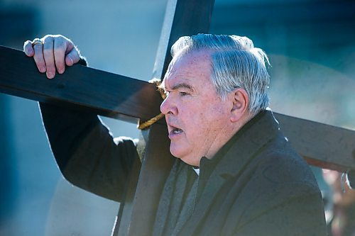 MIKAELA MACKENZIE / WINNIPEG FREE PRESS
Archbishop Richard Gagnon leads the Way of the Cross march near the St. Vital Catholic Church in Winnipeg on Friday, March 30, 2018. 
Mikaela MacKenzie / Winnipeg Free Press 30, 2018.