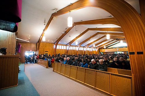 MIKAELA MACKENZIE / WINNIPEG FREE PRESS
Cindy Cordeiro reads out the readings and reflections for the first station of the cross in St. Vital Catholic Church at the Way of the Cross march in Winnipeg on Friday, March 30, 2018. 
Mikaela MacKenzie / Winnipeg Free Press 30, 2018.