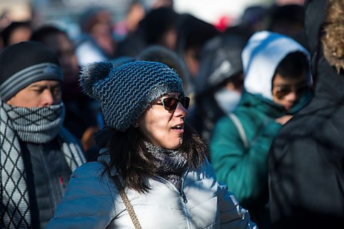 MIKAELA MACKENZIE / WINNIPEG FREE PRESS
Cindy Cordeiro sings at the second station of the cross during the Way of the Cross march near the St. Vital Catholic Church in Winnipeg on Friday, March 30, 2018. 
Mikaela MacKenzie / Winnipeg Free Press 30, 2018.