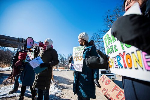 MIKAELA MACKENZIE / WINNIPEG FREE PRESS
Molly McCracken leads a protest opposing the fee-based model that will take effect in the new gardens takes place outside the Assiniboine Park Conservatory  in Winnipeg on Saturday, March 31, 2018. This was the last day the conservatory was open, and many visitors came to say their last goodbyes.
Mikaela MacKenzie / Winnipeg Free Press 31, 2018.