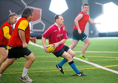 MIKAELA MACKENZIE / WINNIPEG FREE PRESS
Winnipeg Wasp Darren Raeside runs with the ball at a practice at the Axworthy Health & RecPlex in Winnipeg on Saturday, March 31, 2018. They are preparing for the 2018 Golden Oldies World Rugby Festival in Christchurch, New Zealand at the end of April.
Mikaela MacKenzie / Winnipeg Free Press 31, 2018.