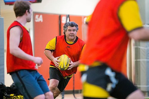 MIKAELA MACKENZIE / WINNIPEG FREE PRESS
Winnipeg Wasp Rick Friesen runs with the ball at a practice at the Axworthy Health & RecPlex in Winnipeg on Saturday, March 31, 2018. They are preparing for the 2018 Golden Oldies World Rugby Festival in Christchurch, New Zealand at the end of April.
Mikaela MacKenzie / Winnipeg Free Press 31, 2018.