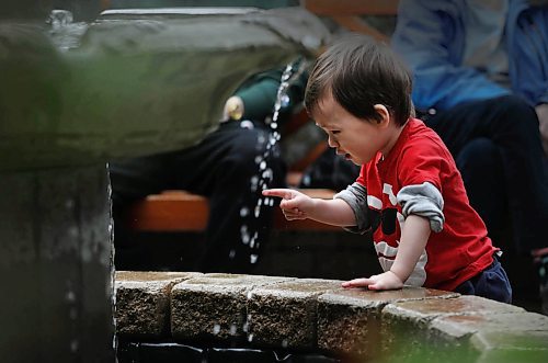 RUTH BONNEVILLE / WINNIPEG FREE PRESS

Calvin Smith (2yrs), puts his finger in the wishing well fountain in the atrium of the Assiniboine Park Conservatory on its final opening day Monday.
Standup photo 

April 02,  2018
