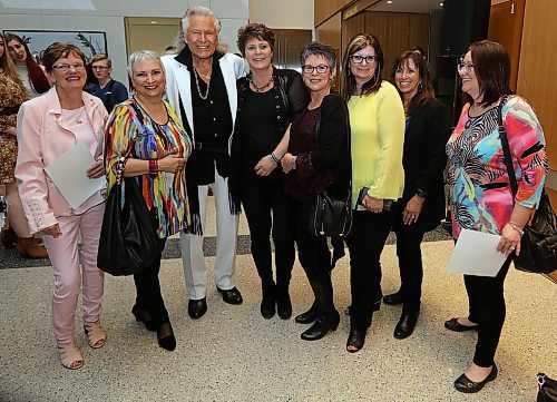 JASON HALSTEAD / WINNIPEG FREE PRESS

Peter Nygard, founder and chairman of Nygard International (third from left), poses for a photo with Nygard Style Direct independent stylists (from left) Patty Wallace, Jocelyn Greenwood, Robin Reiter, Angela Dolinski, Debbie Jensen, Faye Last and Lise Blahy at the Nygard 50 Years in Fashion event at the RBC Convention Centre Winnipeg on March 16, 2018. (See Social Page)