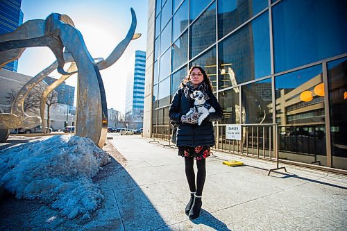 MIKAELA MACKENZIE / WINNIPEG FREE PRESS
Darya Omelchenko, who has gotten has gotten special permission to bring her therapy dog, peanut, into court with her pauses for a portrait on her way into the Law Courts in Winnipeg on Tuesday, April 3, 2018. Shes an immigration consultant, and is going to testify that she was physically assaulted by another immigration lawyer when she worked for him.
Mikaela MacKenzie / Winnipeg Free Press 03, 2018.