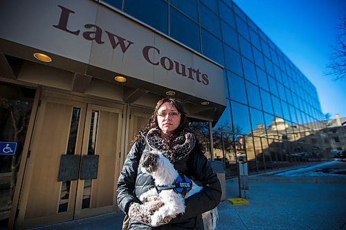 MIKAELA MACKENZIE / WINNIPEG FREE PRESS
Darya Omelchenko, who has gotten has gotten special permission to bring her therapy dog, peanut, into court with her pauses for a portrait on her way into the Law Courts in Winnipeg on Tuesday, April 3, 2018. Shes an immigration consultant, and is going to testify that she was physically assaulted by another immigration lawyer when she worked for him.
Mikaela MacKenzie / Winnipeg Free Press 03, 2018.