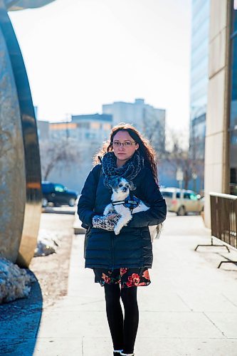 MIKAELA MACKENZIE / WINNIPEG FREE PRESS
Darya Omelchenko, who has gotten has gotten special permission to bring her therapy dog, peanut, into court with her pauses for a portrait on her way into the Law Courts in Winnipeg on Tuesday, April 3, 2018. Shes an immigration consultant, and is going to testify that she was physically assaulted by another immigration lawyer when she worked for him.
Mikaela MacKenzie / Winnipeg Free Press 03, 2018.