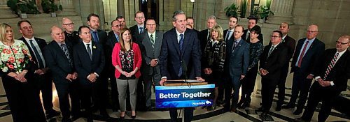 BORIS MINKEVICH / WINNIPEG FREE PRESS
Ambulance fees announcement in the Rotunda of the Legislative Building. Premier Brian Pallister talks to the press with his team behind him. April 3, 2018