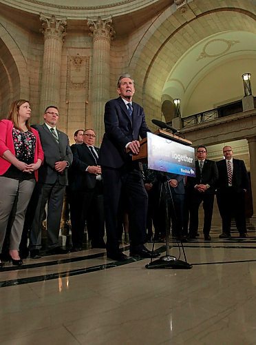 BORIS MINKEVICH / WINNIPEG FREE PRESS
Ambulance fees announcement in the Rotunda of the Legislative Building. Premier Brian Pallister talks to the press with his team behind him. April 3, 2018