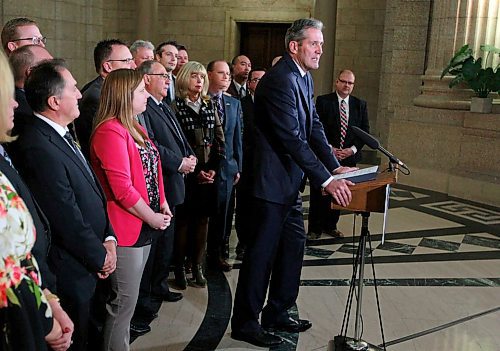 BORIS MINKEVICH / WINNIPEG FREE PRESS
Ambulance fees announcement in the Rotunda of the Legislative Building. Premier Brian Pallister talks to the press with his team behind him. April 3, 2018