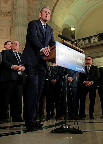 BORIS MINKEVICH / WINNIPEG FREE PRESS
Ambulance fees announcement in the Rotunda of the Legislative Building. Premier Brian Pallister talks to the press with his team behind him. April 3, 2018