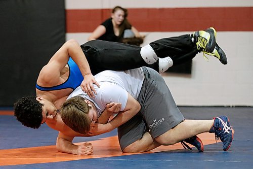 JOHN WOODS / WINNIPEG FREE PRESS
Kyle Steeves (white) and Jacob Harvey wrestle at Schewa Wrestling Tuesday, April 3, 2018. Steeves and some of his teammates are going to the nationals.