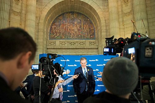 MIKAELA MACKENZIE / WINNIPEG FREE PRESS
Premier Brian Pallister scrums with the media about tax issues with his property in Costa Rica at the Manitoba Legislative Building in Winnipeg on Wednesday, April 4, 2018.