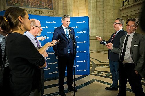 MIKAELA MACKENZIE / WINNIPEG FREE PRESS
Premier Brian Pallister scrums with the media about tax issues with his property in Costa Rica at the Manitoba Legislative Building in Winnipeg on Wednesday, April 4, 2018.