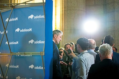 MIKAELA MACKENZIE / WINNIPEG FREE PRESS
Premier Brian Pallister scrums with the media about tax issues with his property in Costa Rica at the Manitoba Legislative Building in Winnipeg on Wednesday, April 4, 2018.