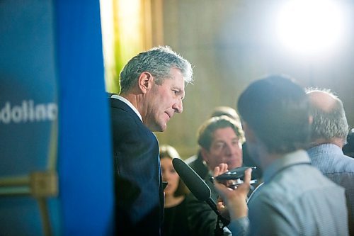 MIKAELA MACKENZIE / WINNIPEG FREE PRESS
Premier Brian Pallister scrums with the media about tax issues with his property in Costa Rica at the Manitoba Legislative Building in Winnipeg on Wednesday, April 4, 2018.