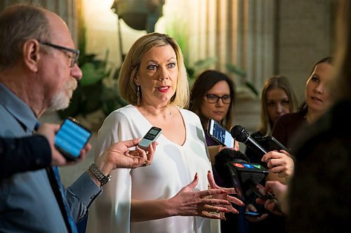 MIKAELA MACKENZIE / WINNIPEG FREE PRESS
Rochelle Squires, minister responsible for the status of women, scrums with the media on bill 219, which would prevent employers from requiring servers to wear high heels on the job, at the Manitoba Legislative Building in Winnipeg on Thursday, April 5, 2018. 
Mikaela MacKenzie / Winnipeg Free Press 2018.