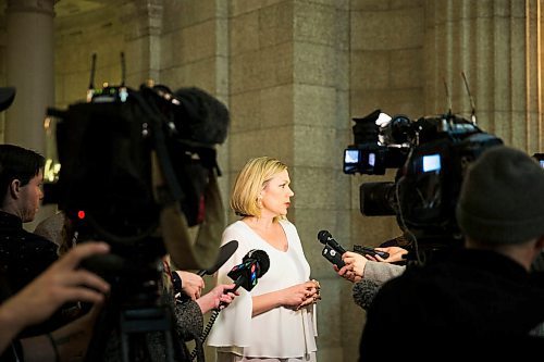 MIKAELA MACKENZIE / WINNIPEG FREE PRESS
Rochelle Squires, minister responsible for the status of women, scrums with the media on bill 219, which would prevent employers from requiring servers to wear high heels on the job, at the Manitoba Legislative Building in Winnipeg on Thursday, April 5, 2018. 
Mikaela MacKenzie / Winnipeg Free Press 2018.