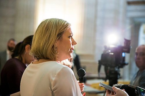 MIKAELA MACKENZIE / WINNIPEG FREE PRESS
Rochelle Squires, minister responsible for the status of women, scrums with the media on bill 219, which would prevent employers from requiring servers to wear high heels on the job, at the Manitoba Legislative Building in Winnipeg on Thursday, April 5, 2018. 
Mikaela MacKenzie / Winnipeg Free Press 2018.