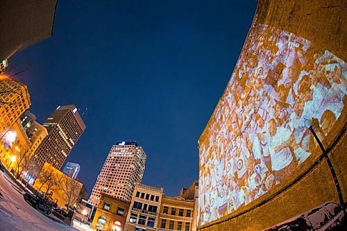 MIKAELA MACKENZIE / WINNIPEG FREE PRESS
Jets fan photos projected onto downtown buildings in Winnipeg on Thursday, April 5, 2018. 
Mikaela MacKenzie / Winnipeg Free Press 2018.