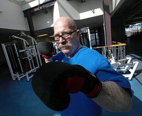 PHIL HOSSACK / WINNIPEG FREE PRESS - Retired cop, Doug Lloyd assumes a fighting stance Friday afternoon at the Rady Centre. When he first started their program for Parkinson's Patients a year and a half ago, he couldn't balance or stand on one leg. See Joel Schlessinger's story. - April 6, 2018