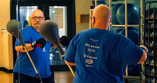 PHIL HOSSACK / WINNIPEG FREE PRESS - Retired cop, Doug Lloyd  takes on a speed bag Friday afternoon at the Rady Centre. He visualizes "Parkinsons" on the bag as he takes a round out of it and the disease. See Joel Schlessinger's story. - April 6, 2018