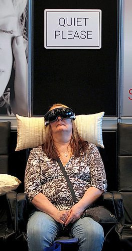 PHIL HOSSACK / WINNIPEG FREE PRESS - "Inner Space Odyssey" - Home and Garden Show patrons take a time out and test the "Magic Touch Eye massage Saturday at the RBC Convention Centre.    - April 7, 2018