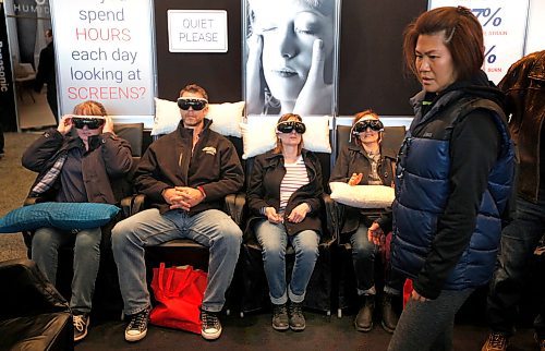 PHIL HOSSACK / WINNIPEG FREE PRESS - "Inner Space Odyssey" - Home and Garden Show patrons take a time out and test the "Magic Touch Eye massage Saturday at the RBC Convention Centre.    - April 7, 2018