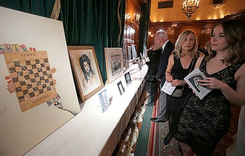 JASON HALSTEAD / WINNIPEG FREE PRESS

Attendees check out artwork at the biennial Border Crossings magazine fundraising gala, Dreams & Nightmares, on March 17, 2018 at the Hotel Fort Garry. (See Social Page)