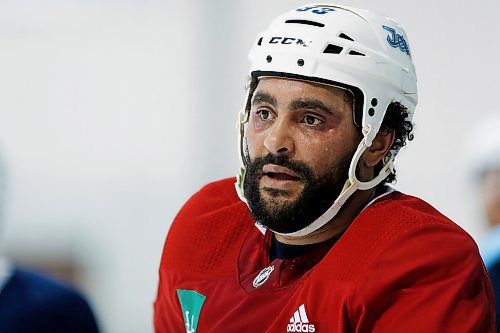 Winnipeg Jets' Dustin Byfuglien (33) looks on during a round one playoff practice in Winnipeg on Monday, April 9, 2018. THE CANADIAN PRESS/John Woods