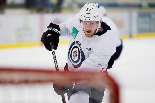 Winnipeg Jets' Nikolaj Ehlers (27) takes a shot during a round one playoff practice in Winnipeg on Monday, April 9, 2018. THE CANADIAN PRESS/John Woods