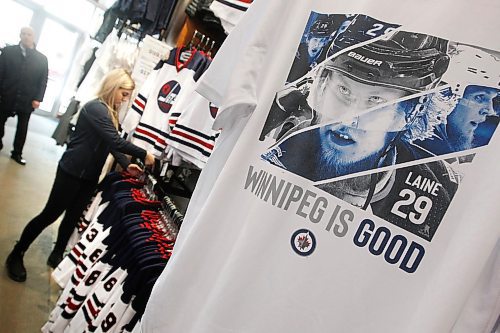 JOHN WOODS / WINNIPEG FREE PRESS
The Jets store staff restock shelves with gear in preparation for the White Out at the Winnipeg Jets' first playoff game against the Minnesota Wild Tuesday, April 10, 2018.