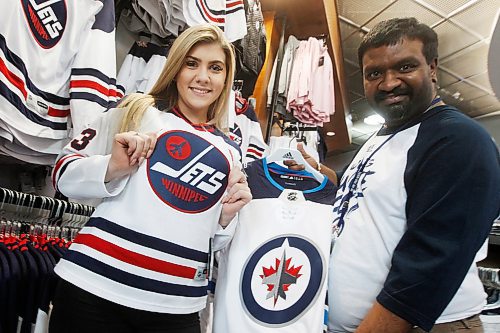 JOHN WOODS / WINNIPEG FREE PRESS
Madison Hudson and Sammy Armogan show off their gear in preparation for the White Out at the Winnipeg Jets' first playoff game against the Minnesota Wild Tuesday, April 10, 2018.