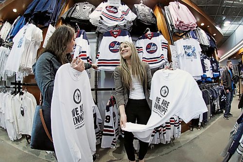 JOHN WOODS / WINNIPEG FREE PRESS
Alex Gilbert and Nicole Pellaers show off their gear in preparation for the White Out at the Winnipeg Jets' first playoff game against the Minnesota Wild Tuesday, April 10, 2018.