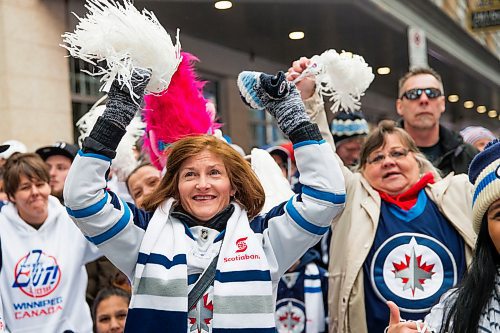 MIKAELA MACKENZIE / WINNIPEG FREE PRESS
Tammie Beauchemin cheers at the Jets whiteout party on Donald Street in Winnipeg on Wednesday, April 11, 2018. 
Mikaela MacKenzie / Winnipeg Free Press 2018.