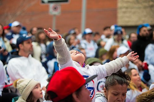 MIKAELA MACKENZIE / WINNIPEG FREE PRESS
Zarayah Richards (three) cheers at the Jets whiteout party on Donald Street in Winnipeg on Wednesday, April 11, 2018. 
Mikaela MacKenzie / Winnipeg Free Press 2018.