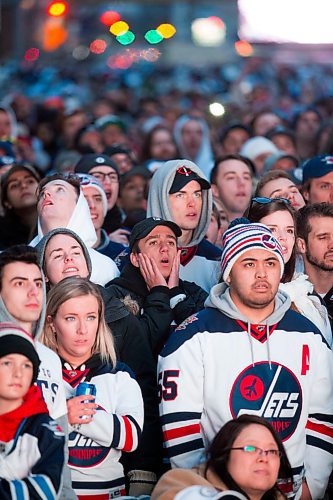 MIKAELA MACKENZIE / WINNIPEG FREE PRESS
The crowd reacts as the Minnesota Wilds score at the Jets whiteout party on Donald Street in Winnipeg on Wednesday, April 11, 2018. 
Mikaela MacKenzie / Winnipeg Free Press 2018.